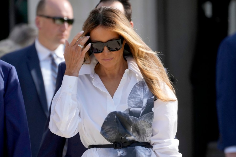 FILE - Former first lady Melania Trump leaves after voting in the Florida primary election in Palm Beach, Fla., March 19, 2024. Former first lady Melania Trump will attend the Republican National Convention next week in Milwaukee. That’s according to two people familiar with her plans who spoke on condition of anonymity before full details are released (AP Photo/Wilfredo Lee, File)