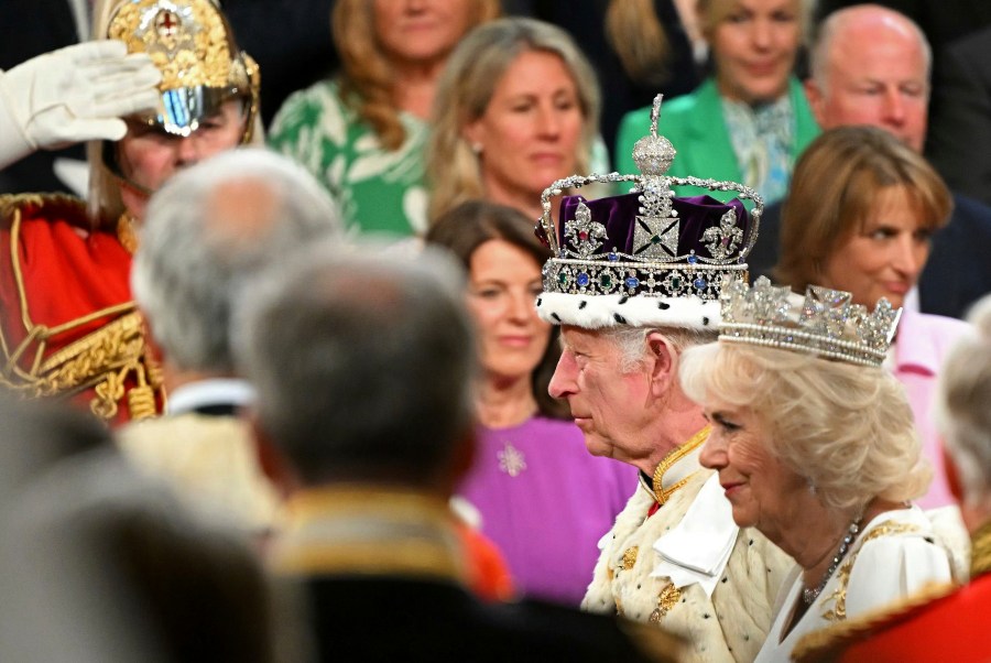 Britain's King Charles III wearing the Imperial State Crown and Britain's Queen Camilla, wearing the George IV State Diadem, attend the State Opening of Parliament, at the Houses of Parliament, in London, Wednesday, July 17, 2024. (Justin Tallis/POOL via AP)