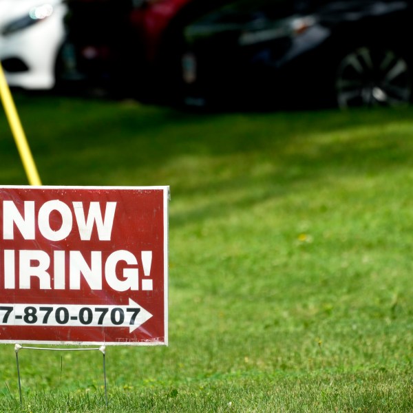 A hiring sign is seen in Wheeling, Ill., Wednesday, July 10, 2024. On Thursday, July 18, 2024, the Labor Department reports on the number of people who applied for unemployment benefits last week. (AP Photo/Nam Y. Huh)