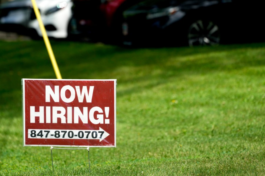 A hiring sign is seen in Wheeling, Ill., Wednesday, July 10, 2024. On Thursday, July 18, 2024, the Labor Department reports on the number of people who applied for unemployment benefits last week. (AP Photo/Nam Y. Huh)