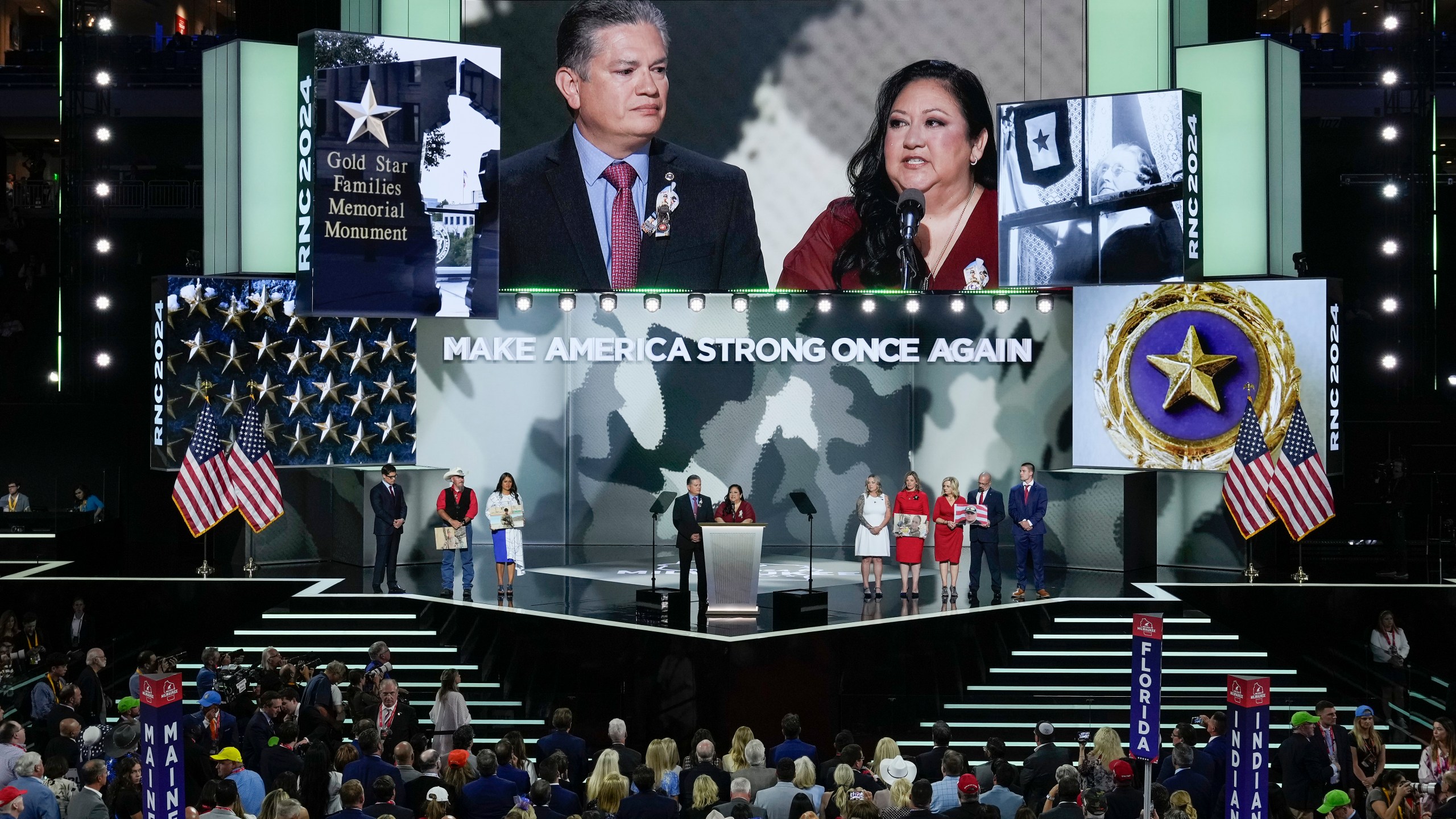 Herman Lopez, left, Alicia Lopez, right, and other Gold Star family members on stage during the Republican National Convention on Wednesday, July 17, 2024, in Milwaukee. (AP Photo/J. Scott Applewhite)