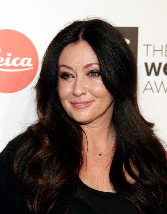 FILE - Actress Shannen Doherty attends the 2014 Webby Awards on Monday, May 19, 2014, in New York. The "Beverly Hills, 90210" star whose life and career were roiled by tabloid stories, Shannen Doherty has died at 53. Doherty's publicist said the actor died Saturday following years with breast cancer. (Photo by Andy Kropa/Invision/AP, File)