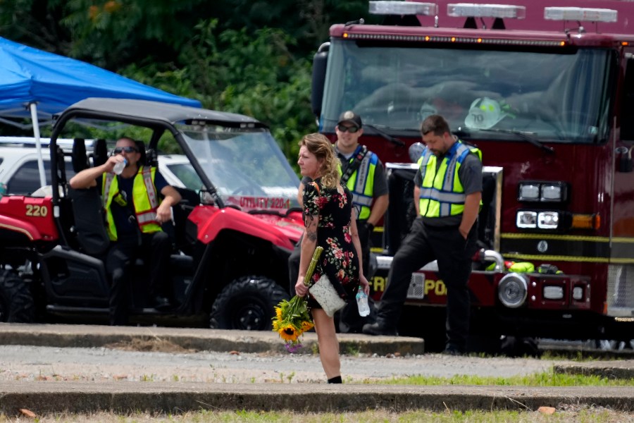 A person arrives to a visitation for Corey Comperatore at Laube Hall, Thursday, July 18,2024, in Freeport, Pa. Comperatore was killed at rally for former President Donald Trump Saturday. (AP Photo/Eric Gay)