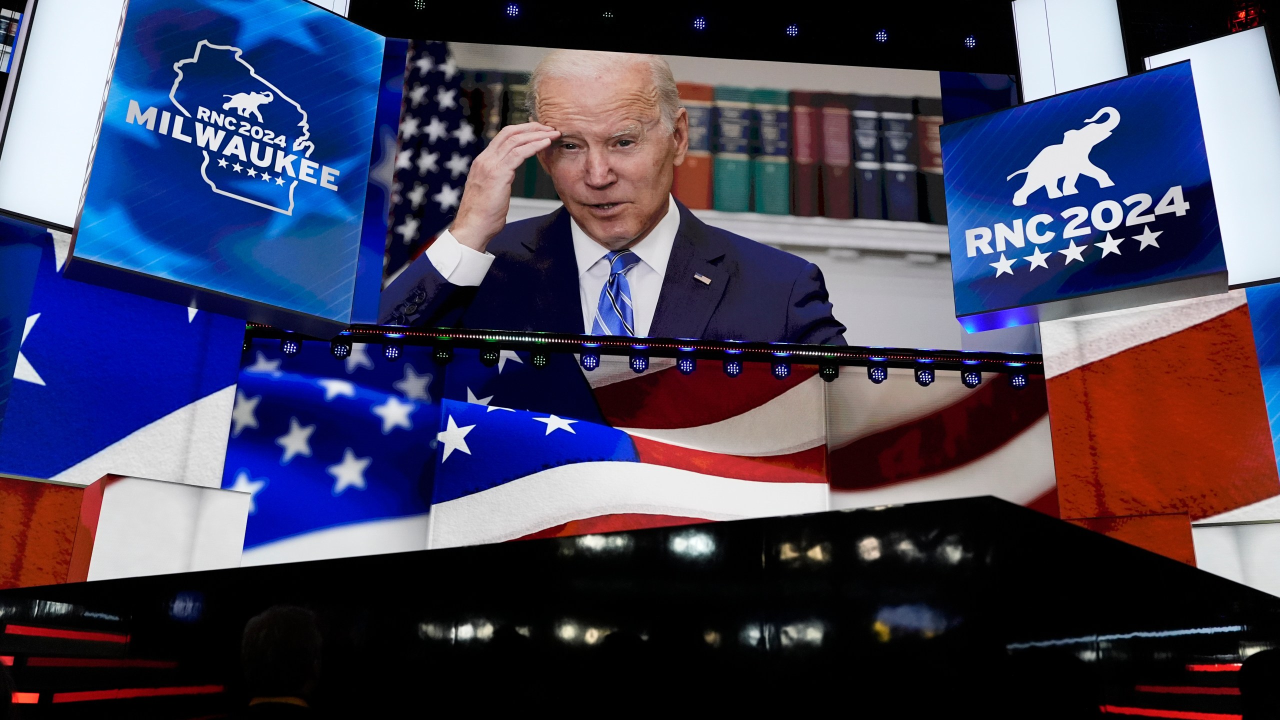 An image of President Joe Biden is projected on a screen during the final night of the 2024 Republican National Convention at the Fiserv Forum, Thursday, July 18, 2024, in Milwaukee. (AP Photo/Carolyn Kaster)