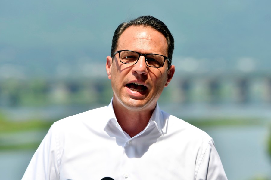 Pennsylvania Gov. Josh Shapiro speaks during a news conference overlooking the Susquehanna River from a balcony at the offices of the Susquehanna River Basin Commission, Tuesday, July 9, 2024, in Harrisburg, Pa. (AP Photo/Marc Levy)