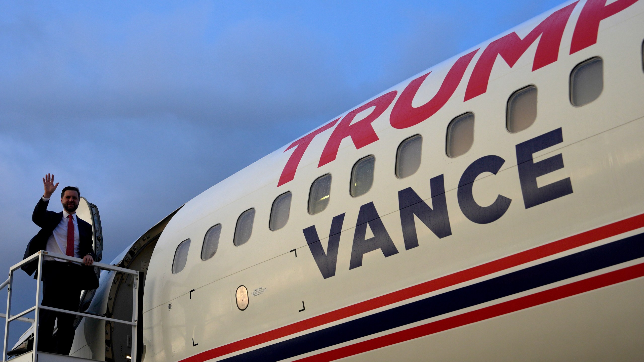 Republican vice presidential candidate Sen. JD Vance, R-Ohio, waves as he boards Trump Force Two at Roanoke-Blacksburg Regional Airport, after a campaign rally Monday, July 22, 2024, in Roanoke, Va. (AP Photo/Julia Nikhinson)