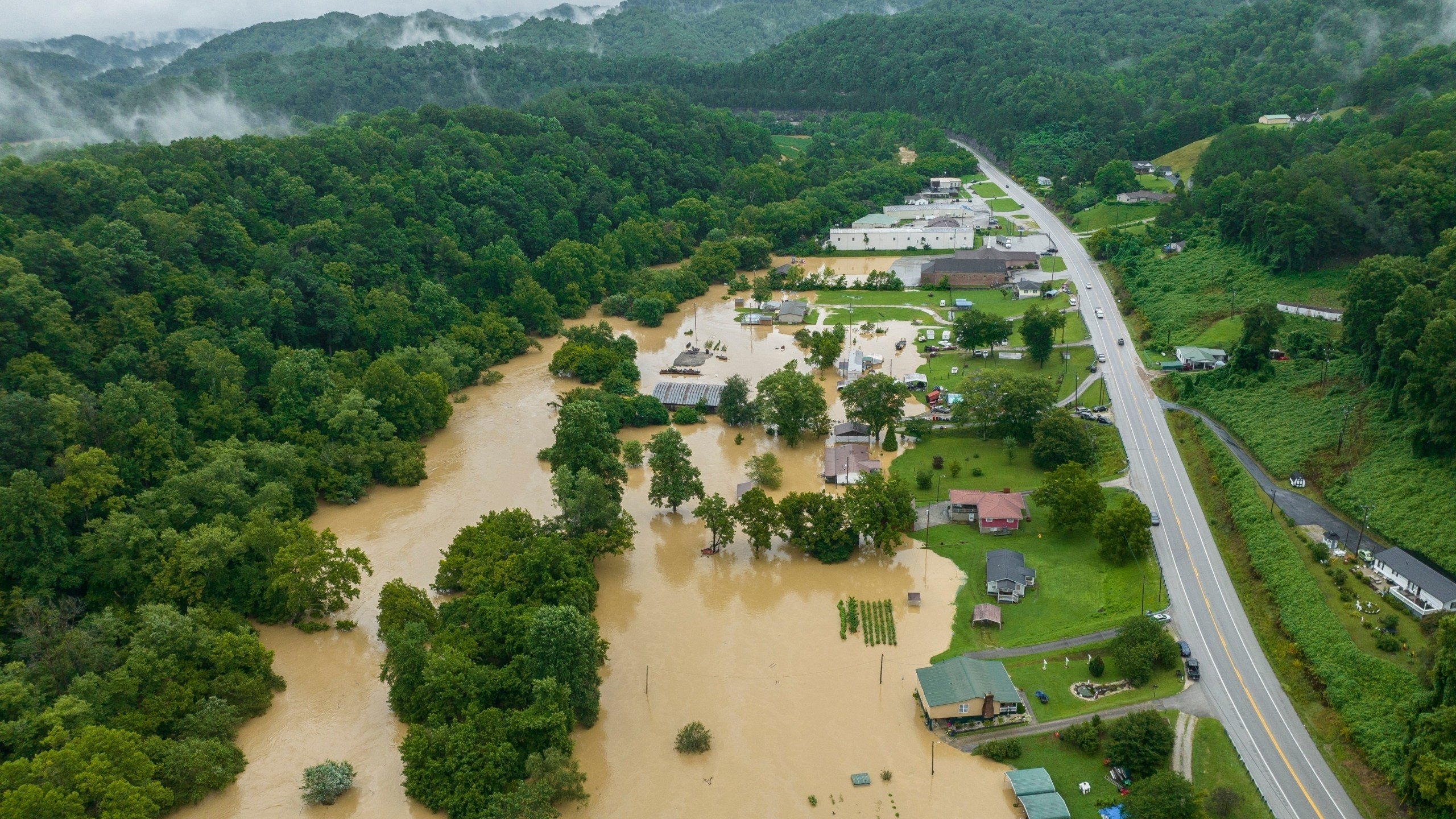 FILE - Homes and structures are flooded near Quicksand, Ky., July 28, 2022. (Ryan C. Hermens/Lexington Herald-Leader via AP, File)