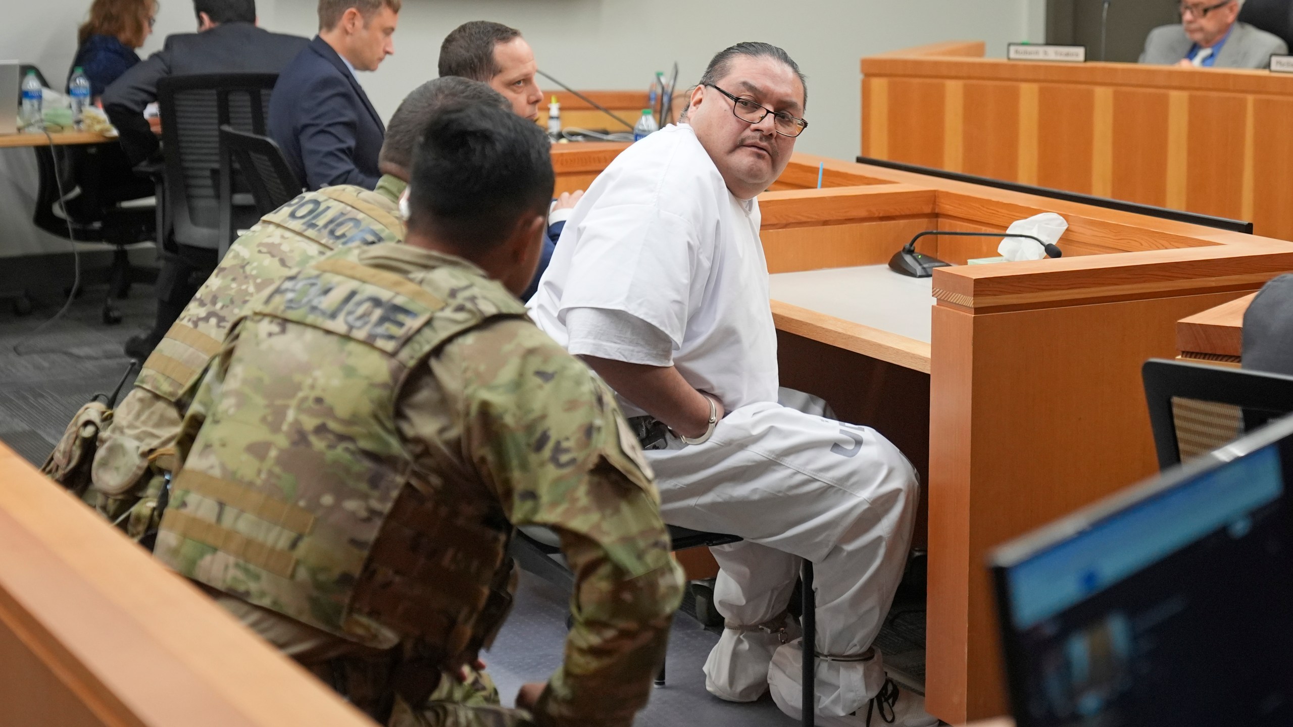 Death row inmate Taberon Honie prepares to walk out after a recess during the Utah Board of Pardons commutation hearing Tuesday, July 23, 2024, at the Utah State Correctional Facility, in Salt Lake City. (AP Photo/Rick Bowmer, Pool)