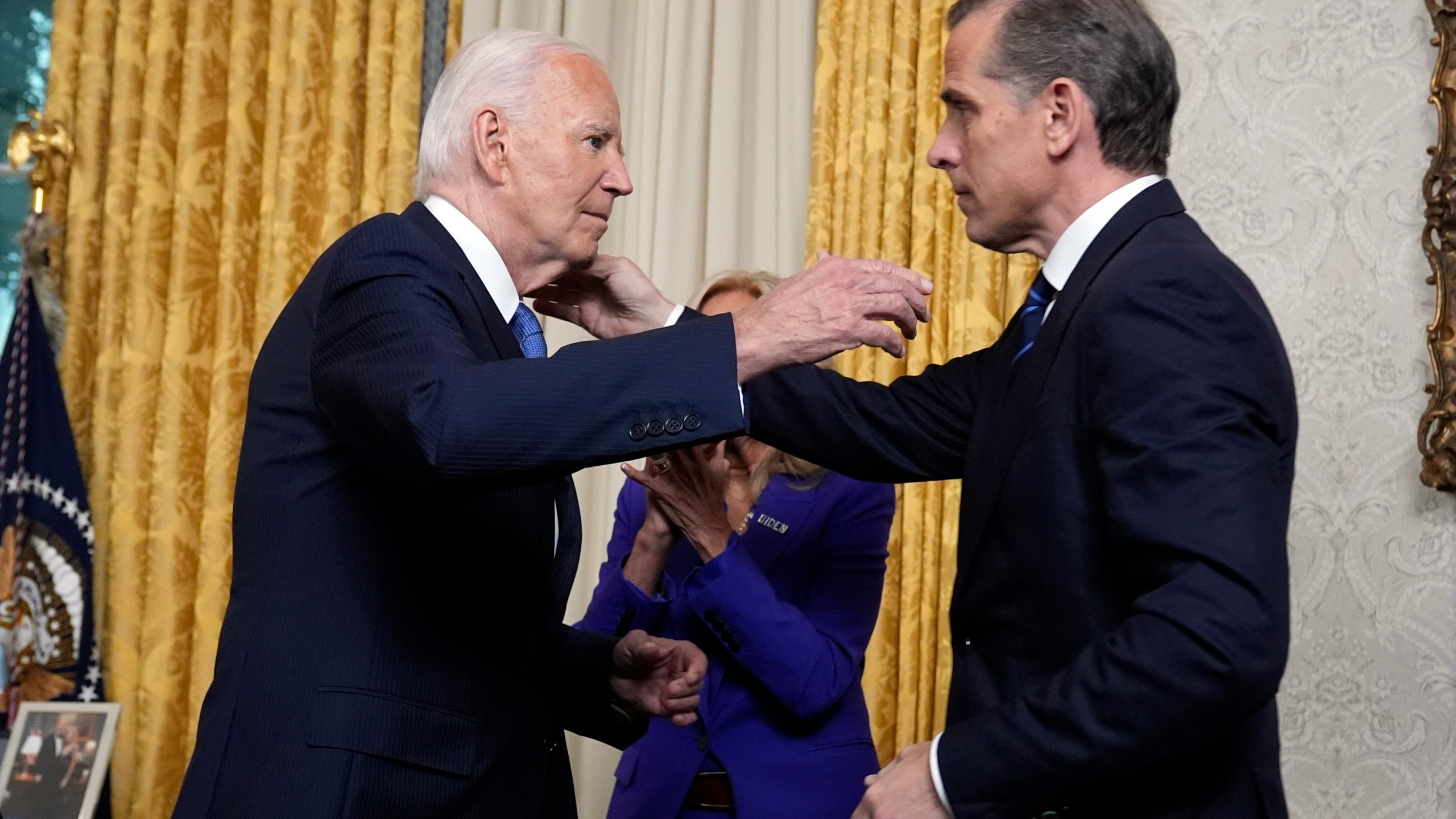 President Joe Biden hugs his son Hunter Biden after addressing the nation from the Oval Office of the White House in Washington, Wednesday, July 24, 2024, about his decision to drop his Democratic reelection bid. (AP Photo/Evan Vucci, Pool)