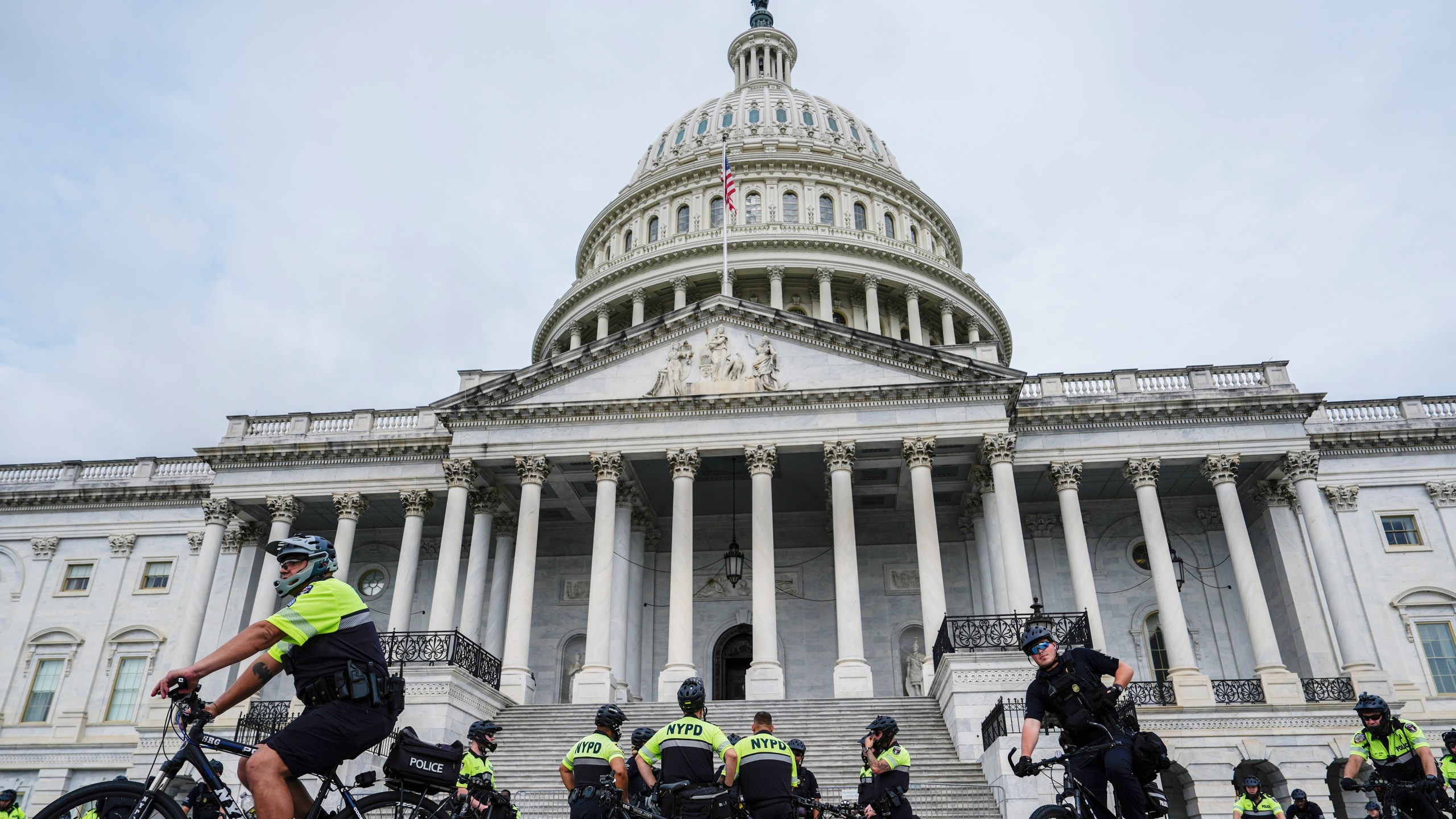 U.S. Capitol Police and NYPD officers stand in front of the Capitol ahead of Israeli Prime Minister Benjamin Netanyahu's speech to a joint meeting of Congress to seek support for Israel's fight against Hamas and other adversaries, Wednesday, July 24, 2024, in Washington. (AP Photo/Julia Nikhinson)