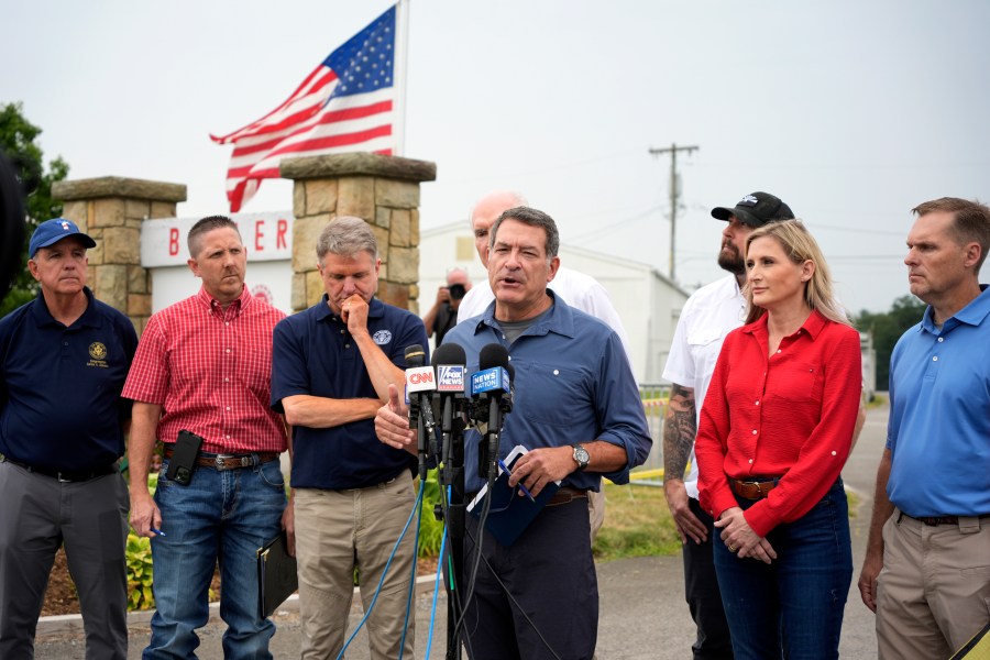 House Committee on Homeland Security Chairman Rep. Mark E. Green, R-Tenn., speaks to reporters after leading a bipartisan visit on Monday, July 22, 2024, to the site of the July 13 Trump campaign rally in Butler, Pa. Pictured from left are Rep. Carlos A. Jimenez, R-Fla., Rep. Josh Brecheen, R-Okla., Rep. Mike McCaul, R-Texas, Rep. Mike Kelly, R-Pa., rear, Rep. Eli Crane, R-Ariz., Rep. Laurel Lee, R-Fla., and Rep. Michael Guest, R-Miss. (AP Photo/Gene J. Puskar)