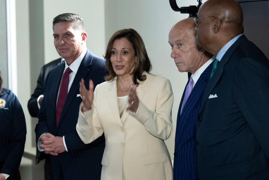 Democratic presidential candidate Vice President Kamala Harris talks after receiving a briefing on Hurricane Beryl recovery efforts at the City of Houston Emergency Operation Center in Houston, Wednesday, July 24, 2024, as Houston Mayor Houston Mayor John Whitmire, second from right, listens. (Brendan Smialowski/Pool via AP)