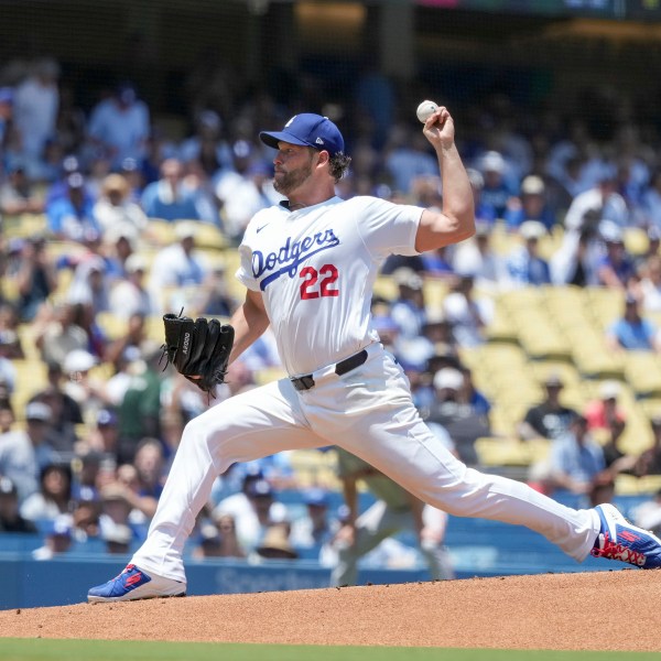 Los Angeles Dodgers starting pitcher Clayton Kershaw (22) throws during the first inning of a baseball game against the San Francisco Giants in Los Angeles, Calif., Thursday, July 25, 2024. (AP Photo/Eric Thayer)