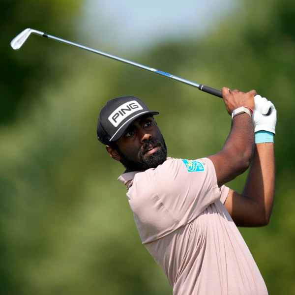 Sahith Theegala hits off the tee on the fourth hole during the first round of the 3M Open golf tournament at the Tournament Players Club, Thursday, July 25, 2024, in Blaine, Minn. (AP Photo/Charlie Neibergall)