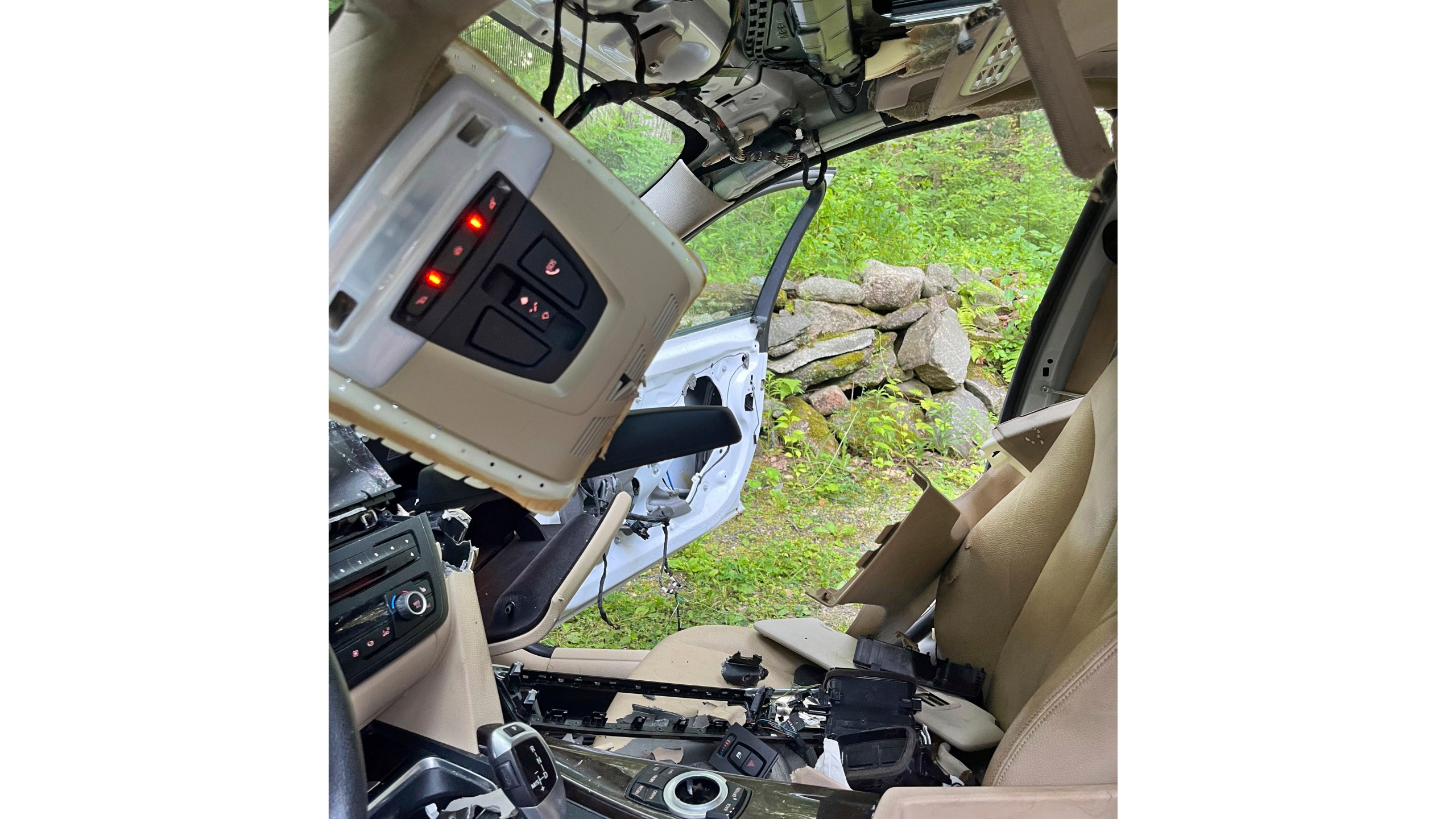 This July 15, 2024, photo shows the damage caused by a bear and cub that broke into a car, and became trapped inside, in Winsted, CT, until freed by state environmental conservation police. It turned out to be the first of three episodes involving bears in Connecticut over six days that were publicly reported by the state Department of Energy and Environmental Protection — another sign of the increasing black bear population in the state. (AP Photo)