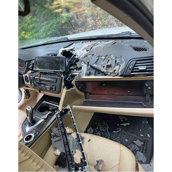 This July 15, 2024, photo shows the damage caused by a bear and cub that broke into a car, and became trapped inside in Winsted, CT, until freed by state environmental conservation police. It turned out to be the first of three episodes involving bears in Connecticut over six days that were publicly reported by the state Department of Energy and Environmental Protection — another sign of the increasing black bear population in the state. (AP Photo)