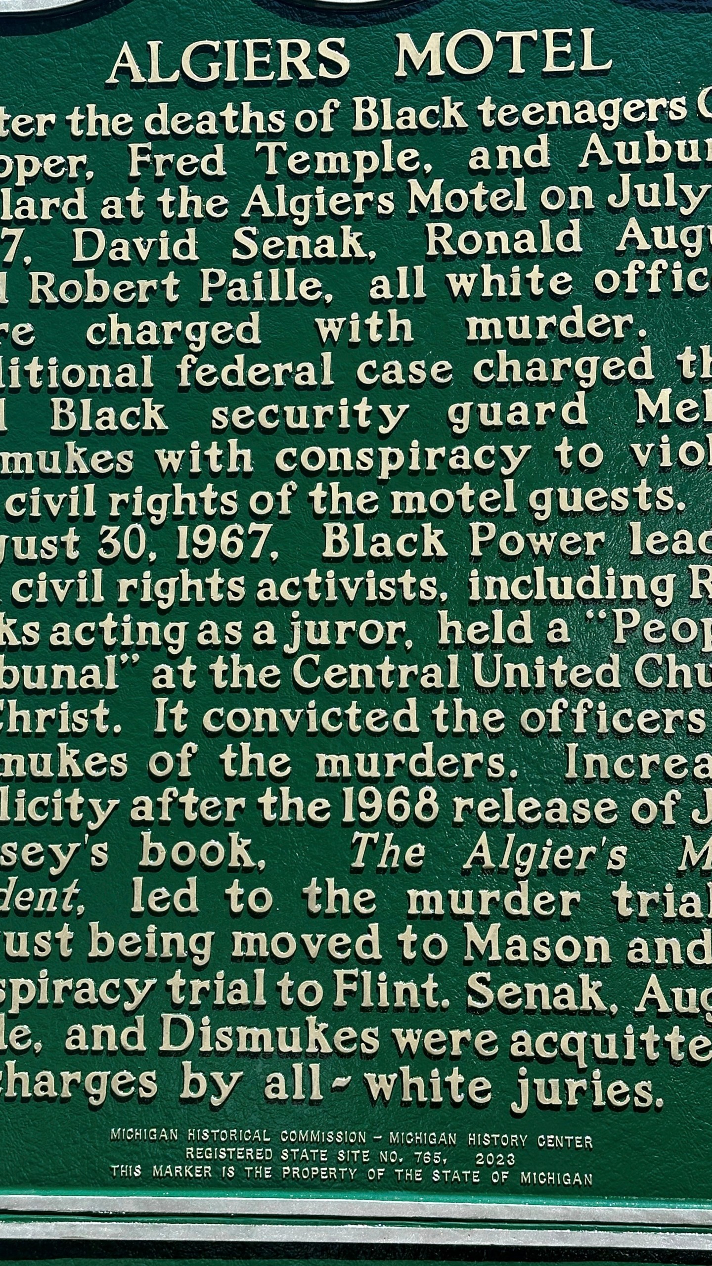 A historic marker was dedicated Friday, July 26, 2024 in Detroit to remember the deaths of Auburey Pollard, 19, Carl Cooper, 17, and Fred Temple, 18, whose bodies were found in the Algiers Motel and adjacent Manor House during the city's 1967 race riot. The young Black men allegedly were killed by white police officers during a raid on the building. No officers ever were convicted in their deaths. (AP Photo/Corey Williams)