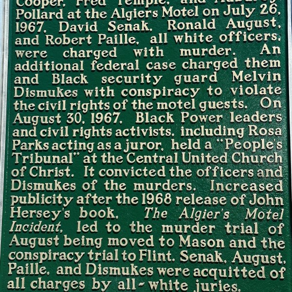 A historic marker was dedicated Friday, July 26, 2024 in Detroit to remember the deaths of Auburey Pollard, 19, Carl Cooper, 17, and Fred Temple, 18, whose bodies were found in the Algiers Motel and adjacent Manor House during the city's 1967 race riot. The young Black men allegedly were killed by white police officers during a raid on the building. No officers ever were convicted in their deaths. (AP Photo/Corey Williams)