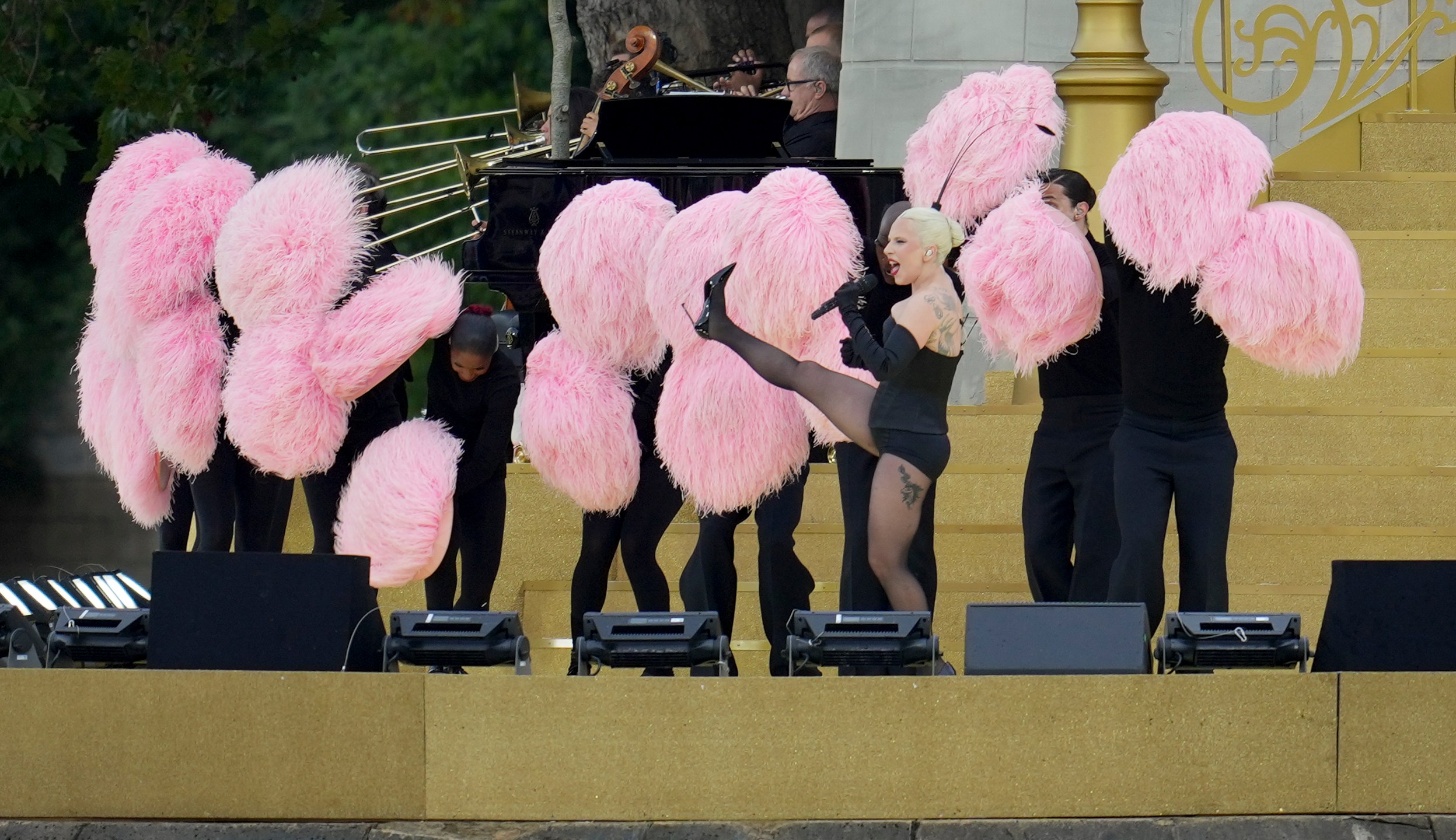 Lady Gaga performs in Paris, France, ahead the opening ceremony of the 2024 Summer Olympics, Friday, July 26, 2024. (AP Photo/Kin Cheung)