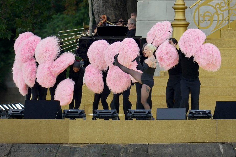 Lady Gaga performs in Paris, France, ahead the opening ceremony of the 2024 Summer Olympics, Friday, July 26, 2024. (AP Photo/Kin Cheung)