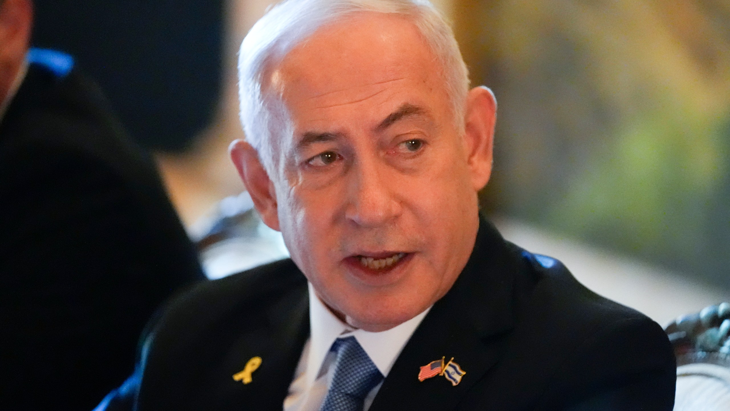 Israeli Prime Minister Benjamin Netanyahu speaks while meeting with Republican presidential candidate former President Donald Trump at his Mar-a-Lago estate, Friday, July 26, 2024, in Palm Beach, Fla. (AP Photo/Alex Brandon)