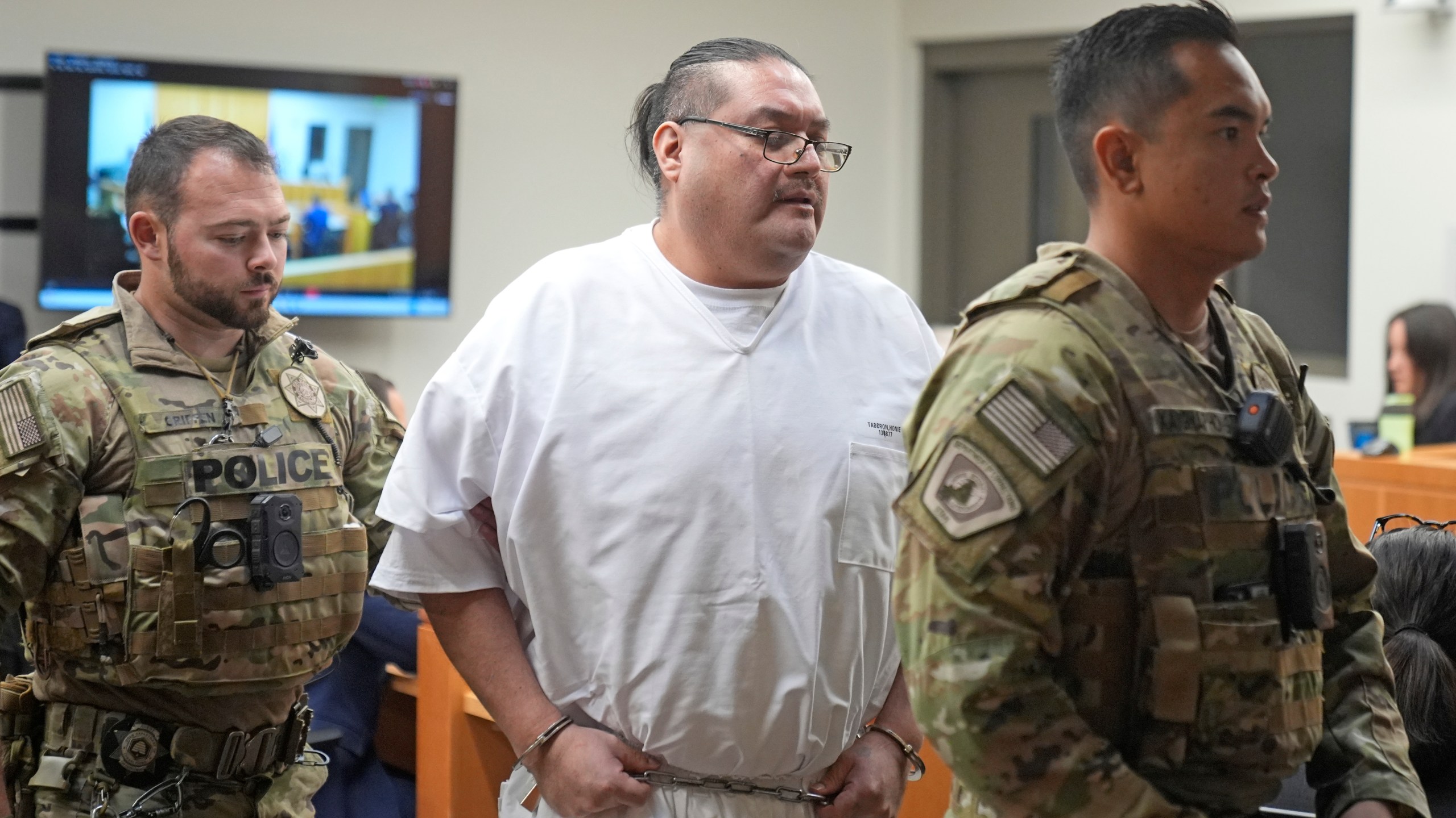 Death row inmate Taberon Honie leaves for break during the Utah Board of Pardons commutation hearing Tuesday, July 23, 2024, at the Utah State Correctional Facility, in Salt Lake City. (AP Photo/Rick Bowmer, Pool)