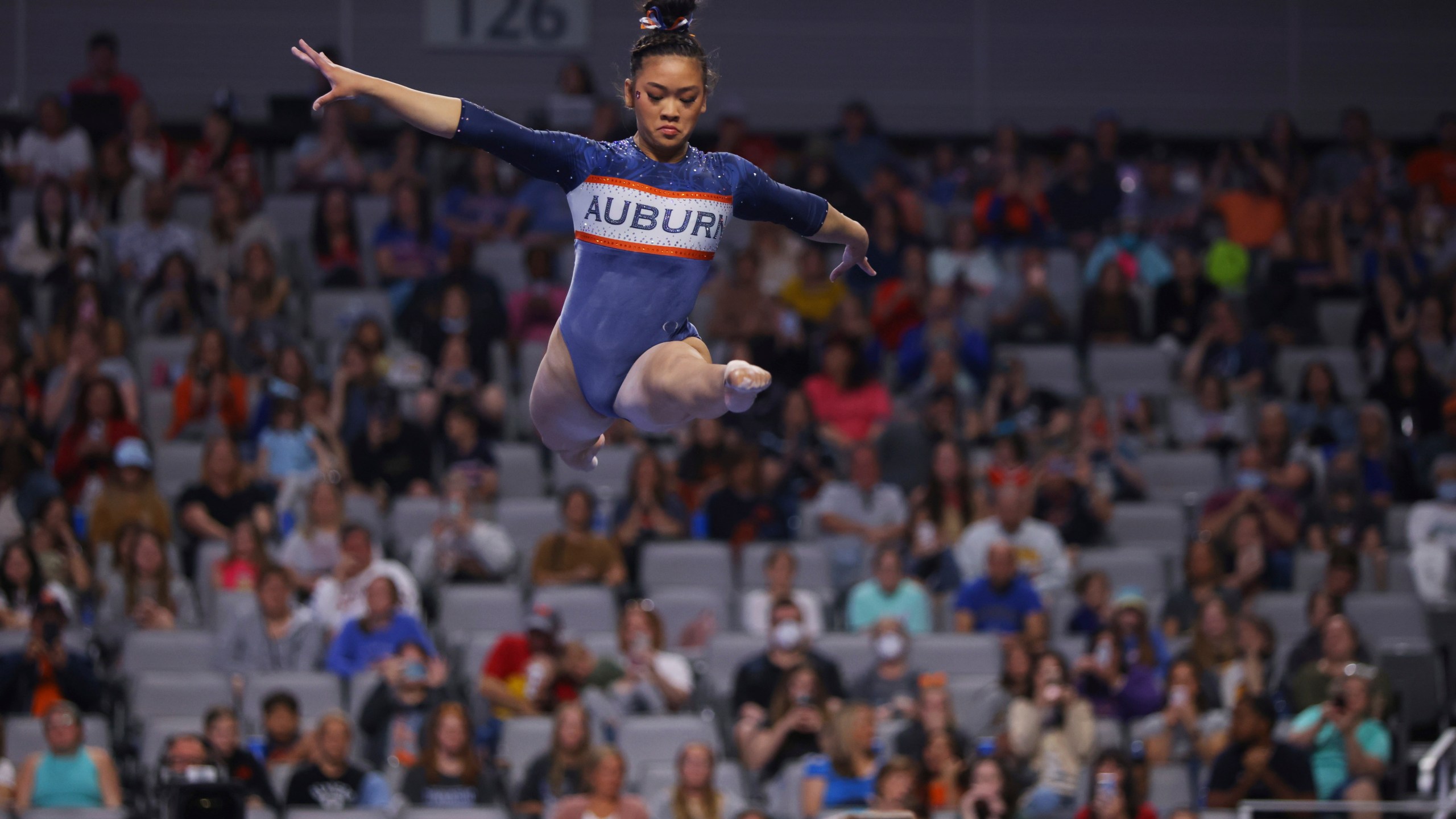 FILE - Auburn's Sunisa Lee competes on the balance beam during the NCAA college women's gymnastics championships, April 16, 2022, in Fort Worth, Texas. (AP Photo/Gareth Patterson, File)