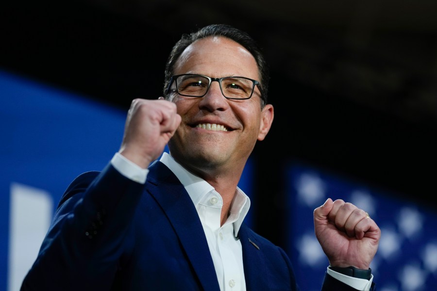 Pennsylvania Gov. Josh Shapiro gestures at a campaign event for Democratic presidential candidate Vice President Kamala Harris in Ambler, Pa., Monday, July 29, 2024. (AP Photo/Matt Rourke)