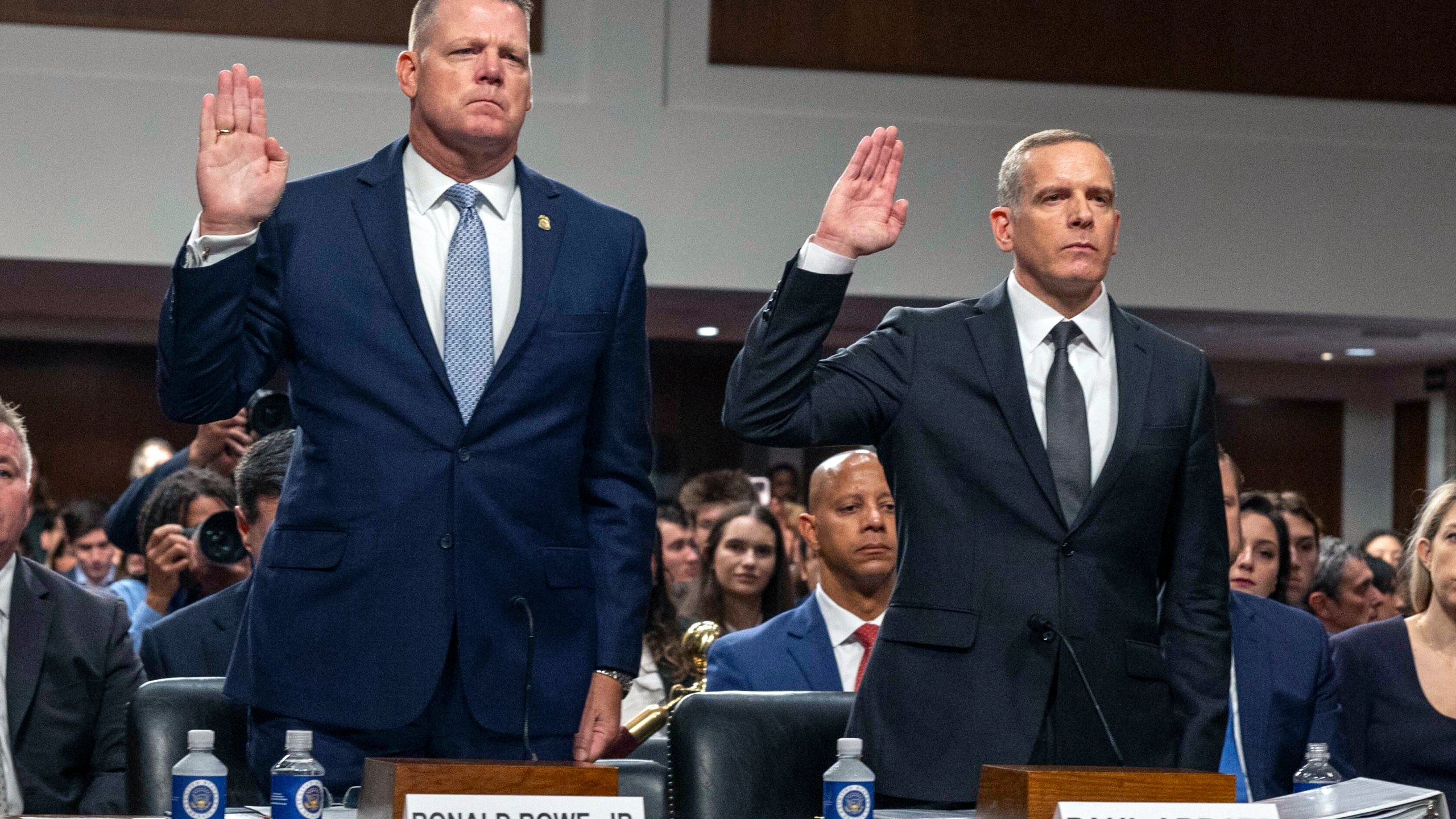 U.S. Secret Service Acting Director Ronald Rowe, left, and FBI Deputy Director Paul Abbate are sworn in before they testify before a Joint Senate Committee on Homeland Security and Governmental Affairs and Senate Committee on the Judiciary hearing examining the security failures leading to the assassination attempt on Republican presidential candidate former President Donald Trump, Tuesday, July 30, 2024 in Washington. (AP Photo/Kevin Wolf)