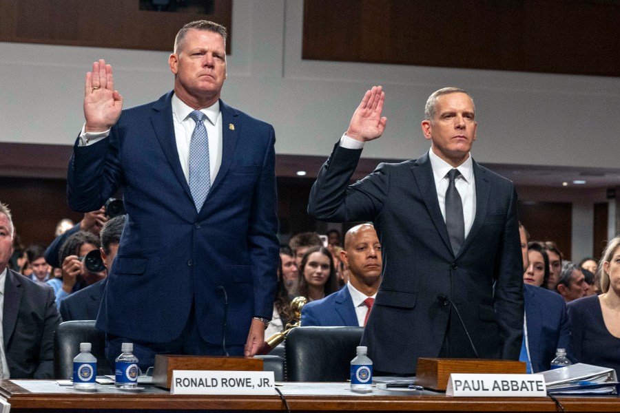 U.S. Secret Service Acting Director Ronald Rowe, left, and FBI Deputy Director Paul Abbate are sworn in before they testify before a Joint Senate Committee on Homeland Security and Governmental Affairs and Senate Committee on the Judiciary hearing examining the security failures leading to the assassination attempt on Republican presidential candidate former President Donald Trump, Tuesday, July 30, 2024 in Washington. (AP Photo/Kevin Wolf)