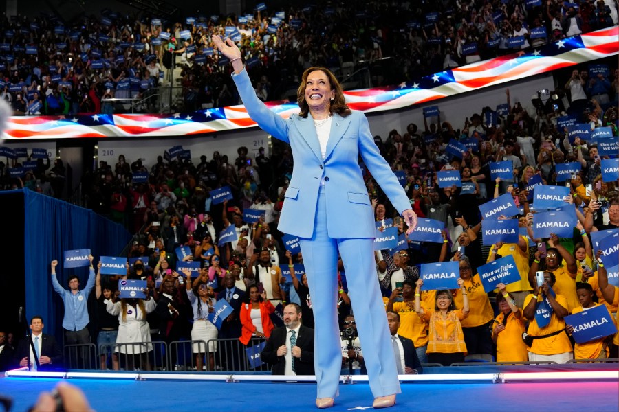 Vice President Kamala Harris waves during a campaign rally, Tuesday, July 30, 2024, in Atlanta. (AP Photo/John Bazemore)