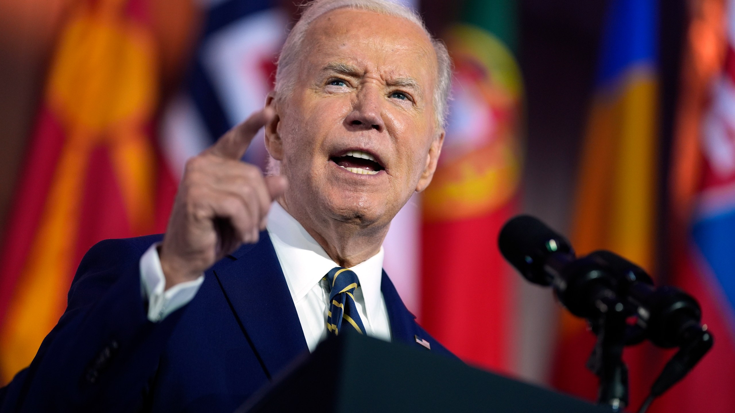 Biden speaking at a NATO summit.