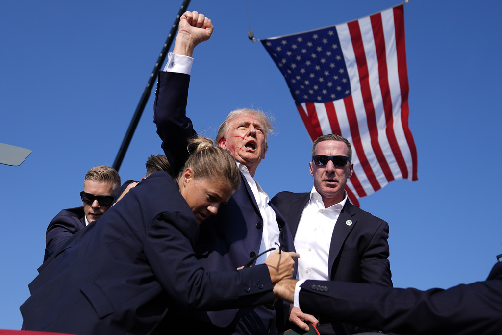 Secret Service rushing Trump off stage