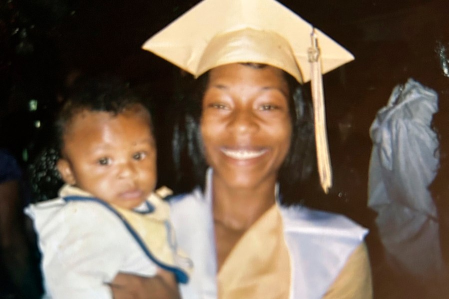 Sonya Massey is depicted with a child.