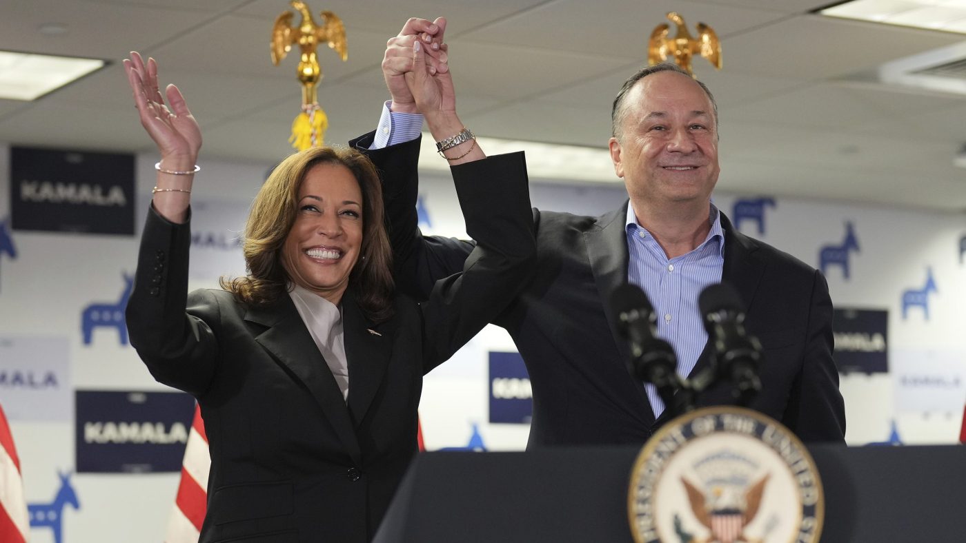 Vice President Kamala Harris, left, and second gentleman Doug Emhoff address staff at her campaign headquarters in Wilmington, Del., Monday, July 22, 2024.