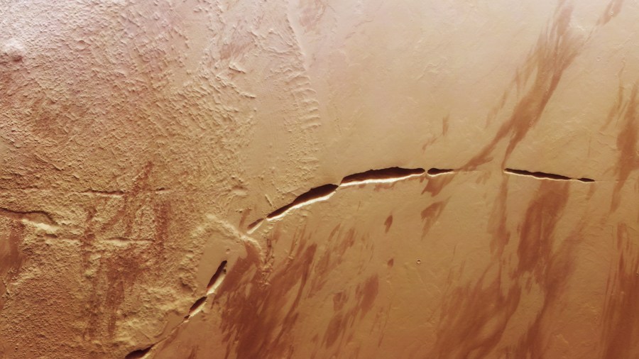 Photos from the European Space Agency show a massive, lava leaking graben on Mars called the Aganippe Fossa.