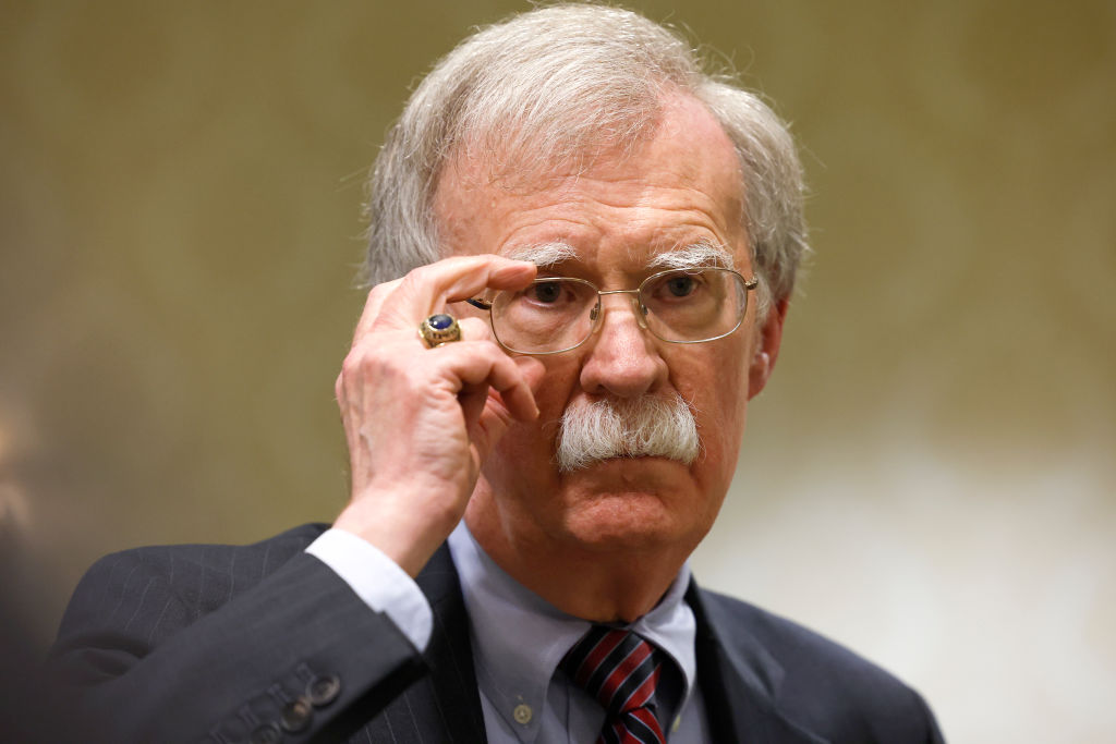 Former National Security Adviser John Bolton speaks to reporters.