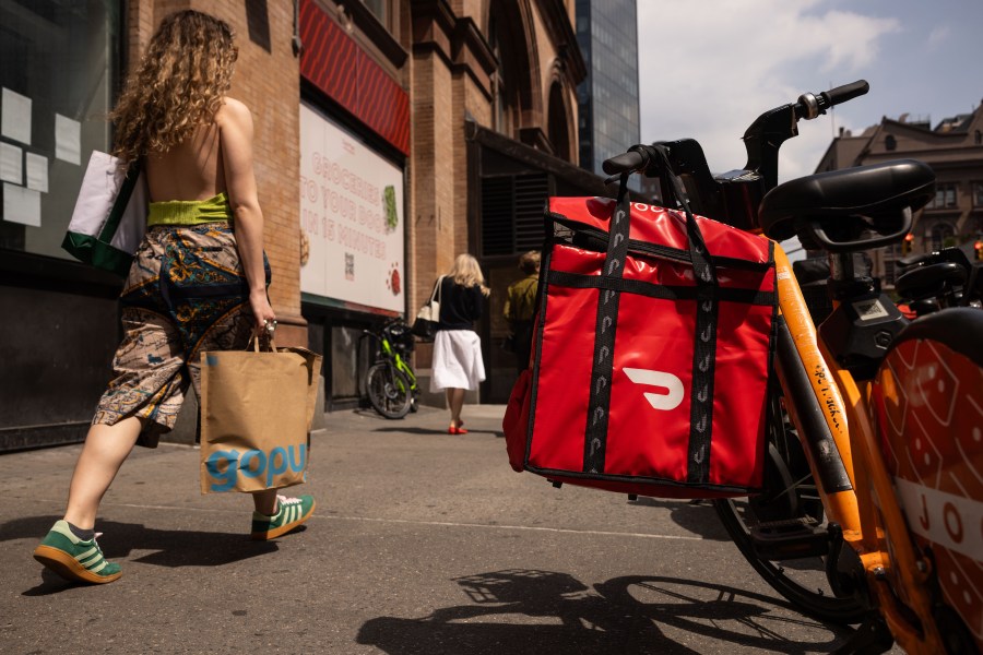 A DoorDash delivery bag outside a DashMart location in New York