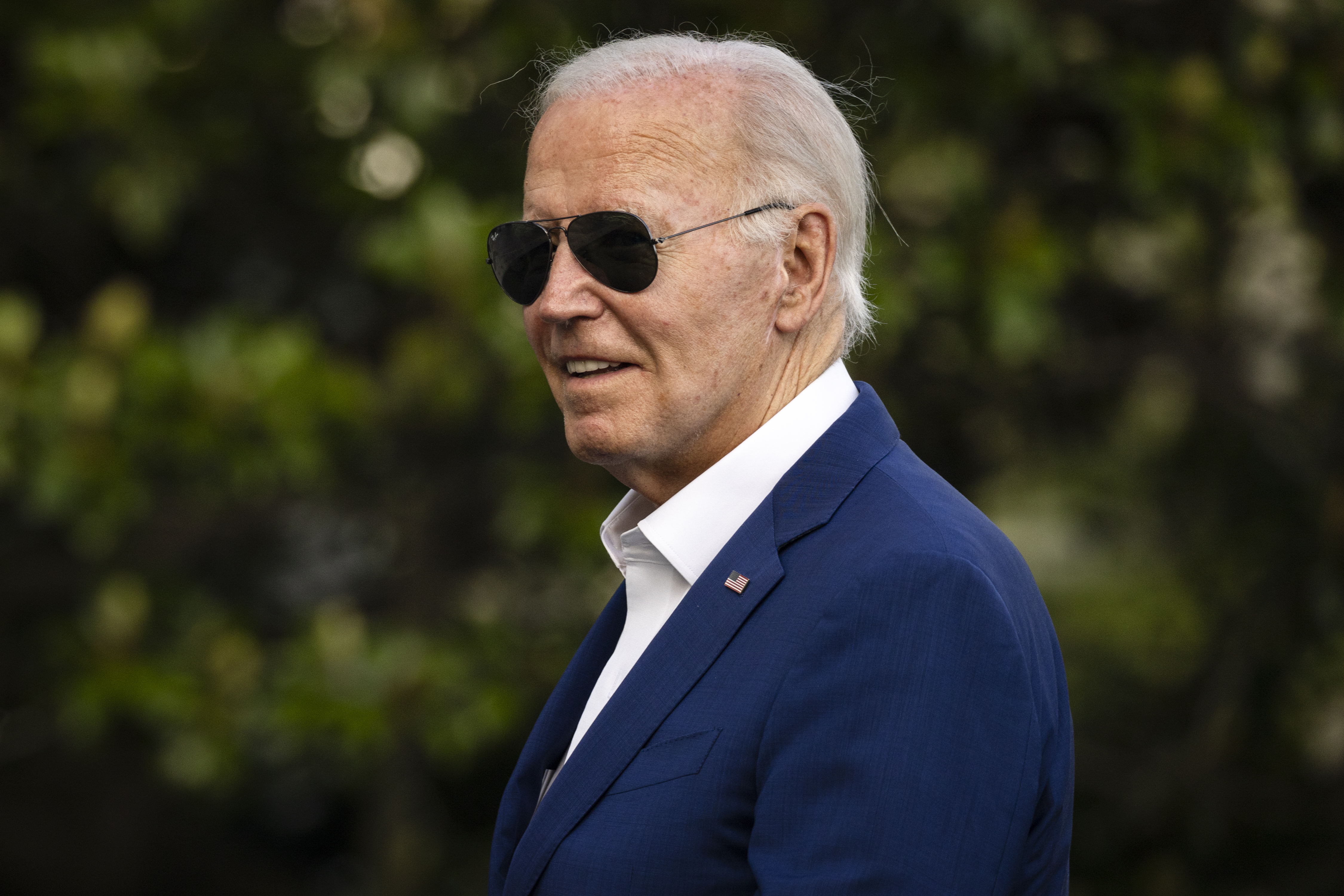 US President Joe Biden walks on the South Lawn of the White House.