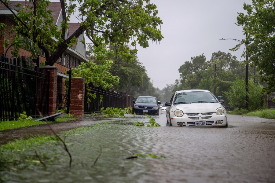 Vehicles sit in floodwater during Hurricane Beryl on July 08, 2024 in Houston, Texas.