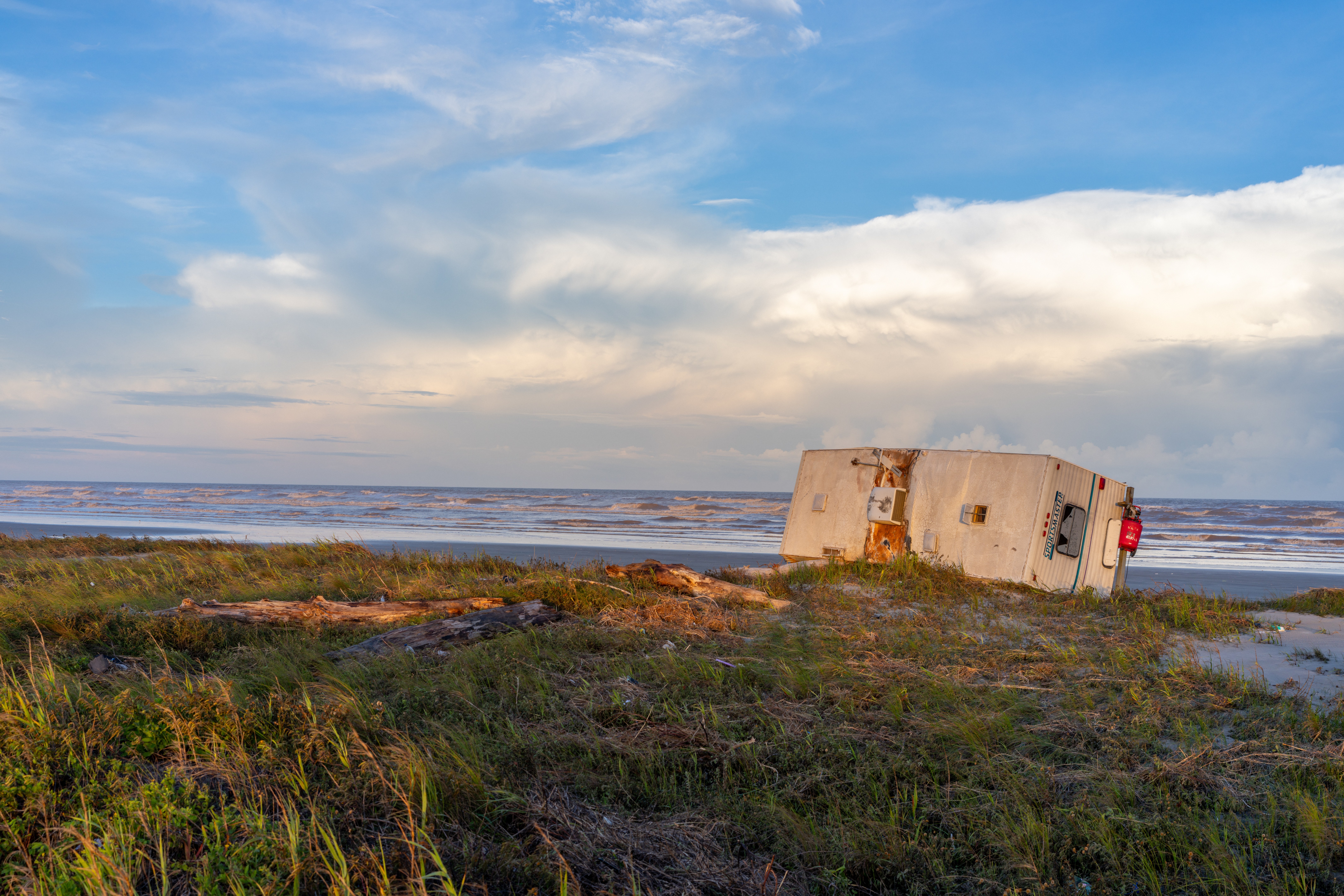 A mobile is collapsed over on shore after Hurricane Beryl swept through the area on July 08, 2024 in Freeport, Texas.