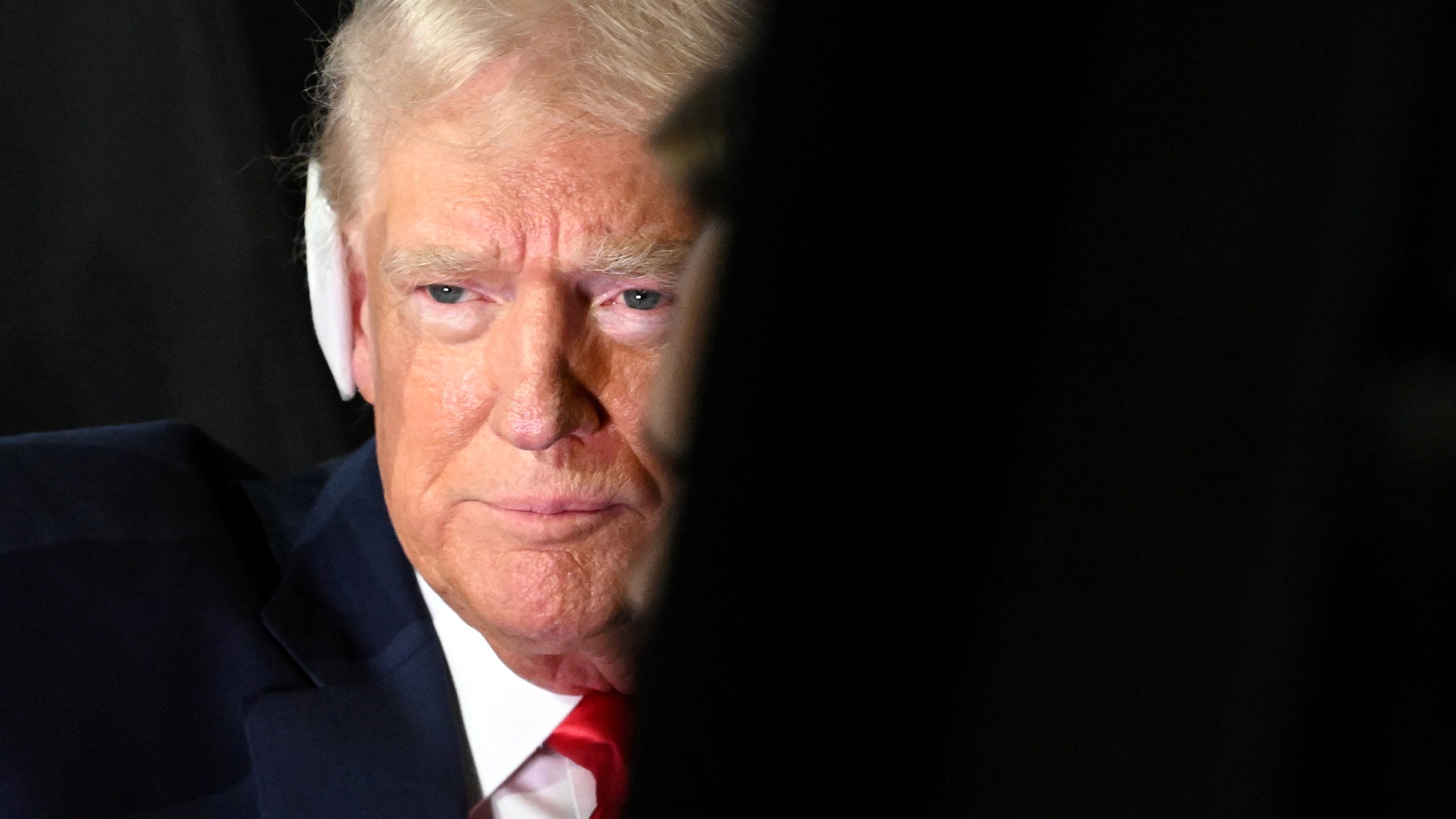 Former US President Donald Trump during the Republican National Convention, his ear bandaged.