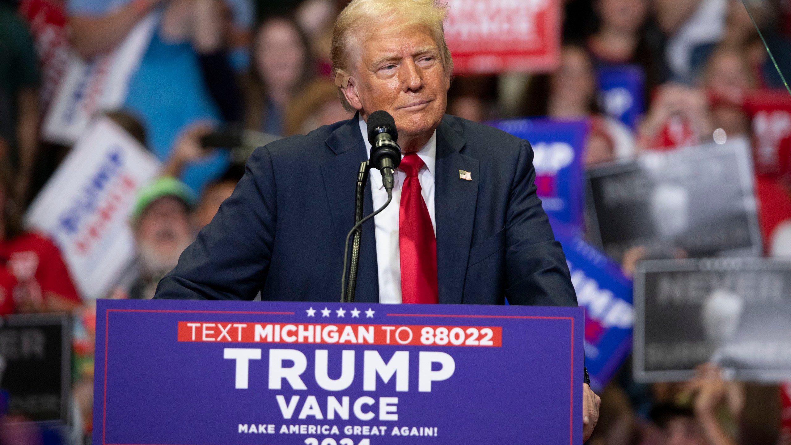 Donald Trump speaking at a public campaign rally on July 20, 2024 in Grand Rapids, Michigan.