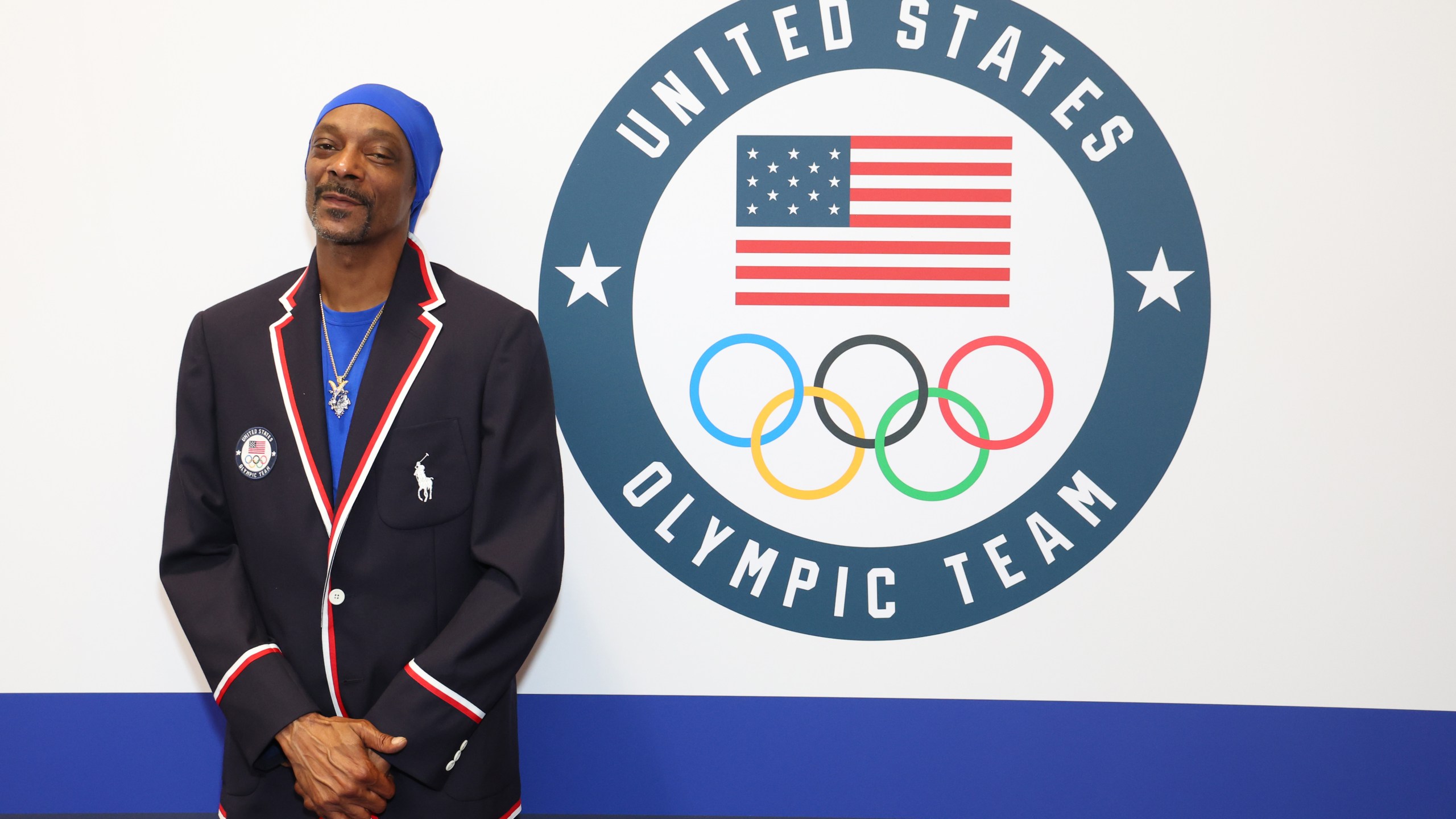 Snoop Dogg tries on clothes during Team USA Welcome Experience ahead of Paris 2024 Summer Olympics at Polo Ralph Lauren on July 21, 2024 in Paris, France.