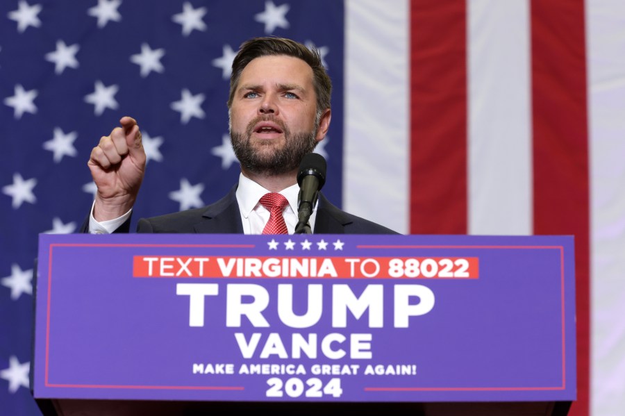 Republican vice presidential nominee JD Vance speaks at a campaign rally in Virginia.