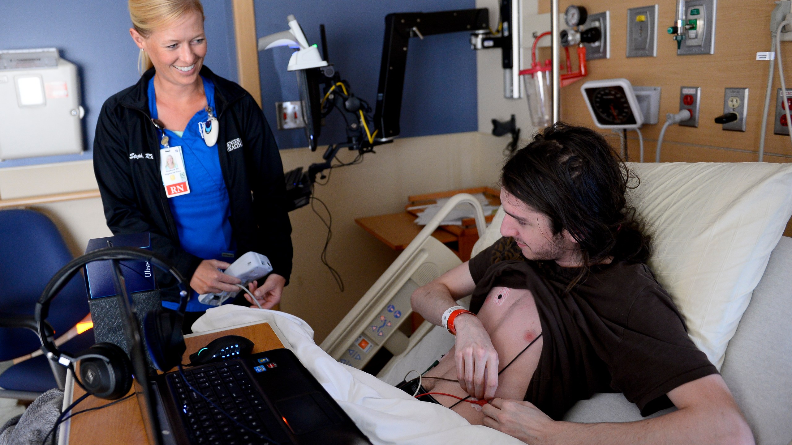 A nurse removes a patient's heart monitor at an easting disorder center in Denver.