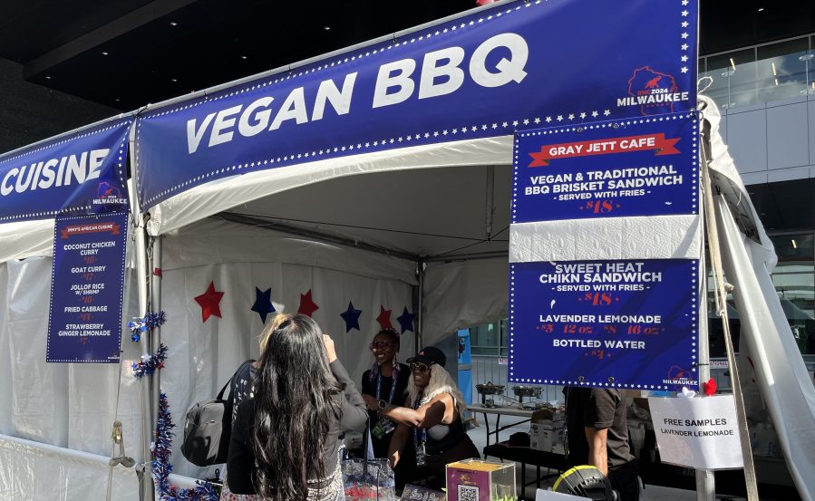 People at RNC buy food from vegan barbecue stall.