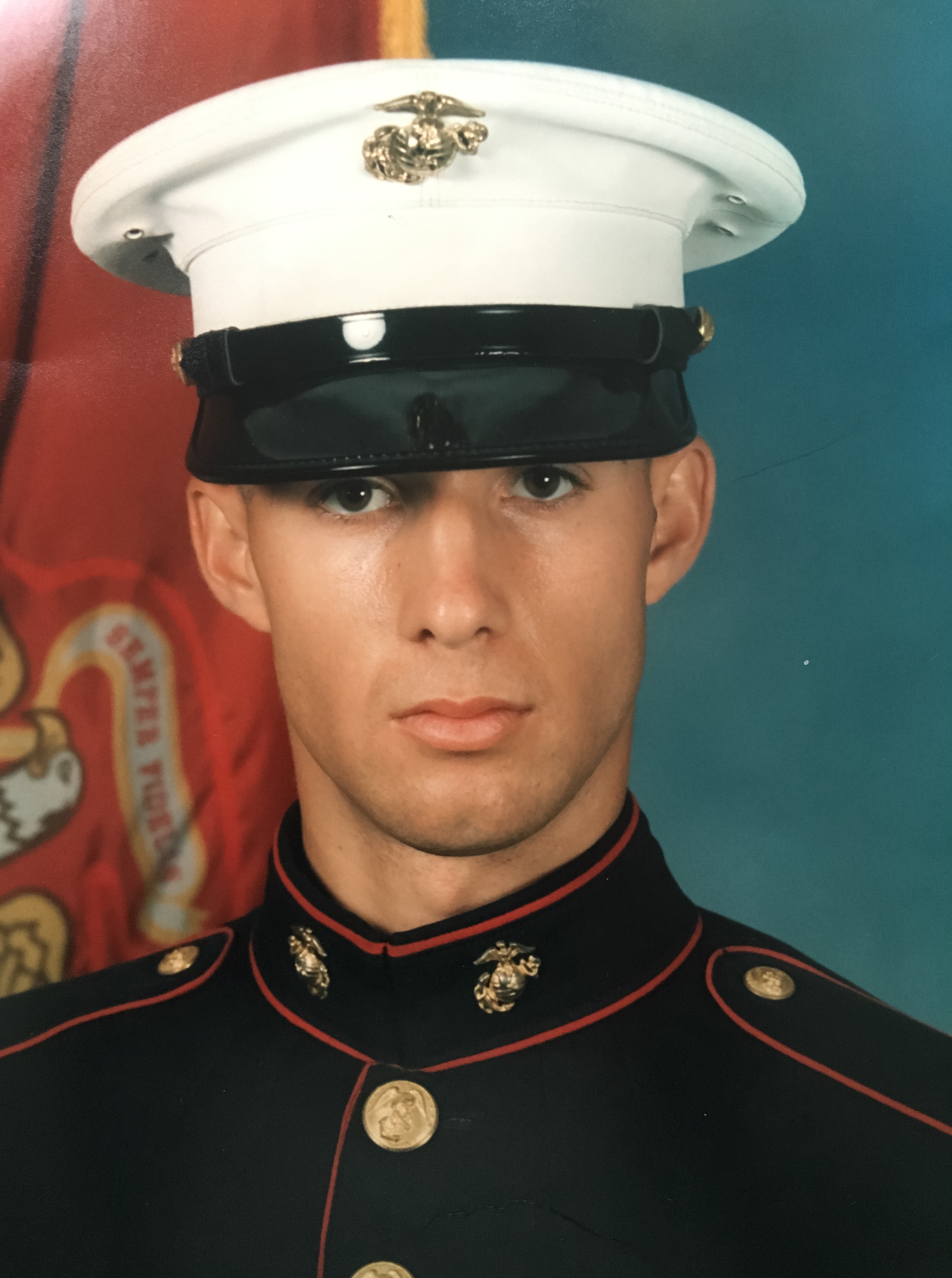 A young man in a Marine uniform.