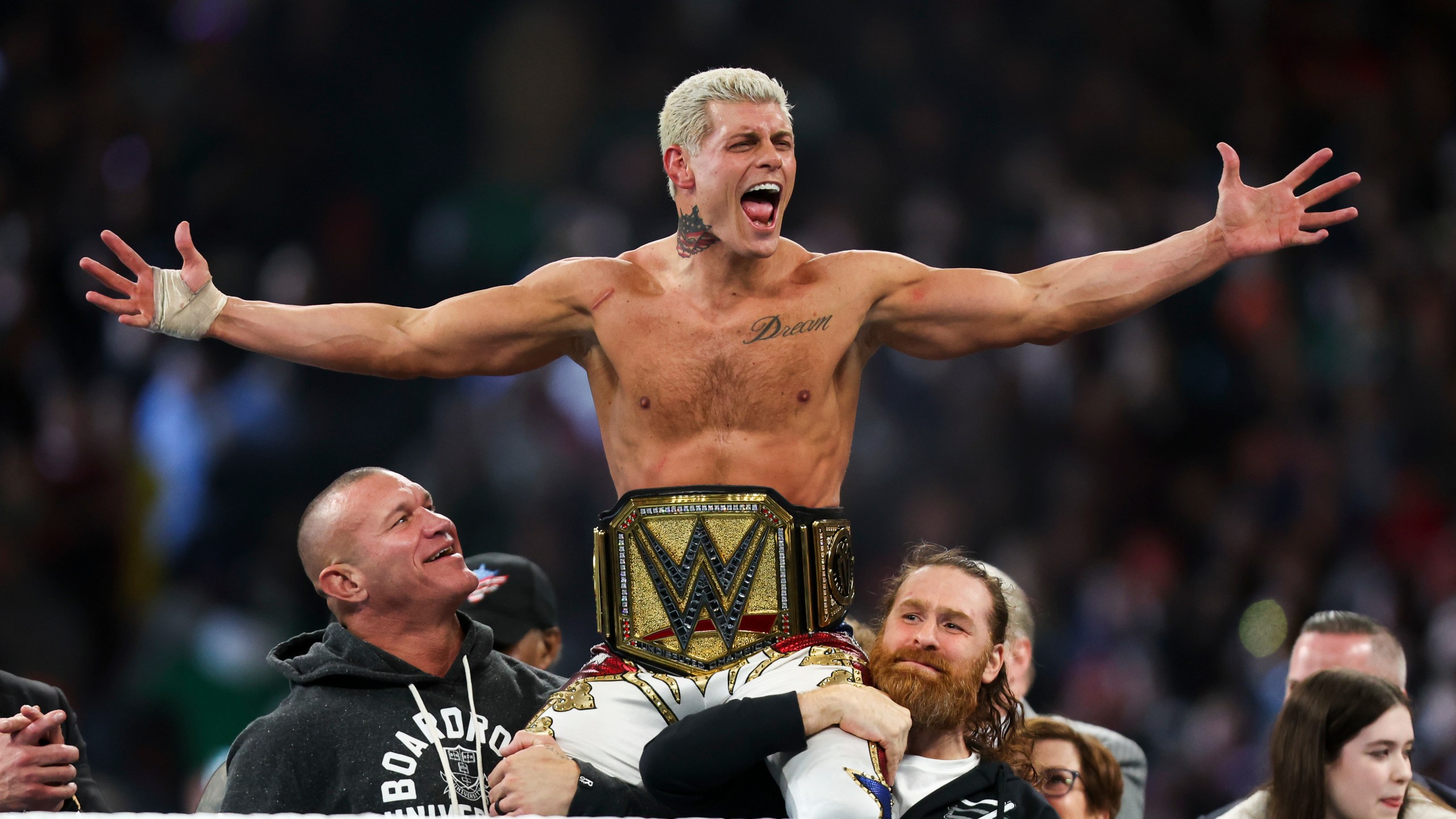 FILE - Cody Rhodes celebrates after winning the Undisputed WWE universal championship match during WrestleMania 40 in Philadelphia, on April 7, 2024. WWE is gearing up for 2024's SummerSlam where Rhodes will be facing off against Solo Sikoa. (Monica Herdon/The Philadelphia Inquirer via AP, File)