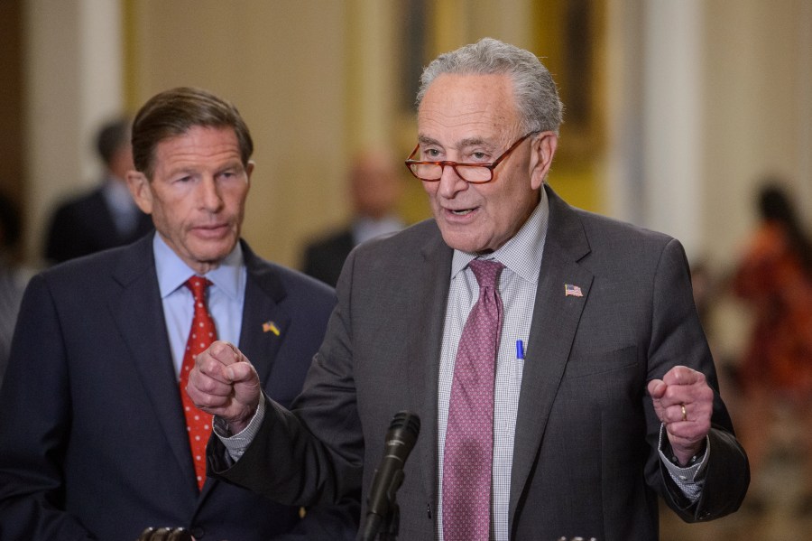 Sen. Richard Blumenthal, D-Conn., left, listens as Senate Majority Leader Chuck Schumer, D-N.Y., offers remarks following the Senate Democrats policy luncheon at the U.S. Capitol Tuesday, July 30, 2024, in Washington. (AP Photo/Rod Lamkey, Jr.)